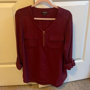 Burgundy blouse with a half zip
